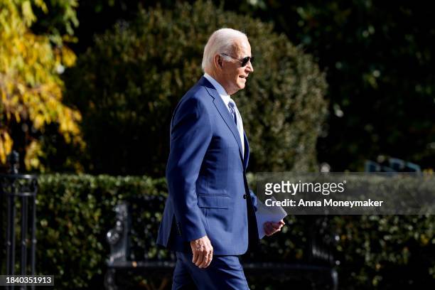 President Joe Biden walks on the South Lawn to board Marine One before departing the White House on December 08, 2023 in Washington, DC. Biden is...