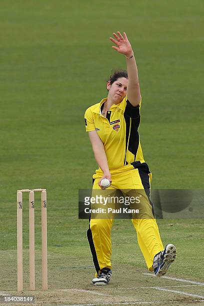 Emma Biss of the Fury bowls during the WT20 match between the Western Australia Fury and the ACT Meteors at the WACA on October 11, 2013 in Perth,...