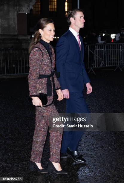 Pippa Middleton and James Matthews attend The "Together At Christmas" Carol Service at Westminster Abbey on December 08, 2023 in London, England.