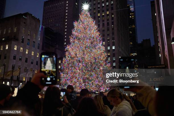 Holiday decorations at Rockefeller Center in New York, US, on Sunday, Dec. 10, 2023. A burnt-out consumer, weighed down by high interest rates and...