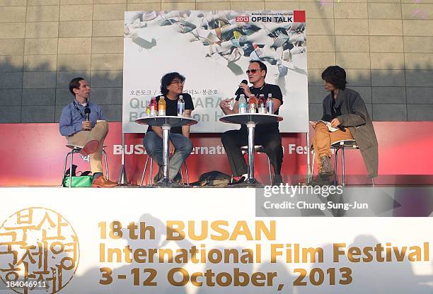 Director Bong Joon-Ho and Quentin Tarantino attend the Open Talk at the Busan Cinema Center Square Outdoor Stage during the 18th Busan International...