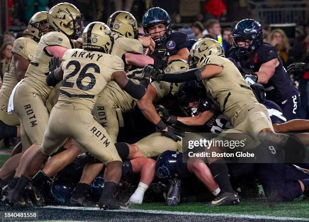 Foxborough, MA Army makes a successful stand at the goal line as Navy was unsuccessful on fourth down. Army beat Navy, 17-11.