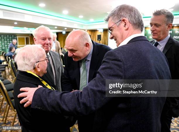 Dublin , Ireland - 9 December 2023; Outgoing FAI president Gerry McAnaney speaks to former Republic of Ireland kit manager Charlie O'Leary in the...
