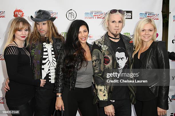 Musician Ginger Fish of Rob Zombie, Rita Lowery and musician John 5 of Rob Zombie attend Rob Zombie's Great American Nightmare VIP opening night...