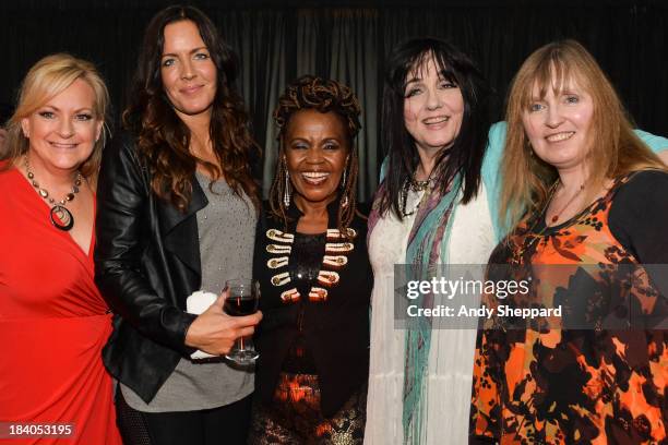 Singers Alison Joy Williams, Mim Grey, PP Arnold, Lynda Hayes and Mandy Bell of The Band of Sisters posed backstage at BBC Club on October 9, 2013 in...