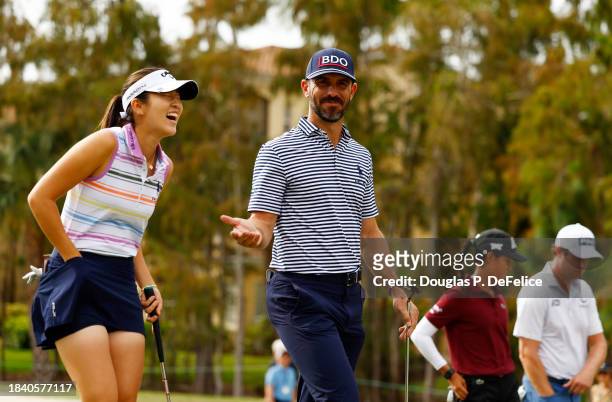 Andrea Lee of the United States, Billy Horschel of the United States during, Celine Boutier of France and Harris English of the United States walk on...