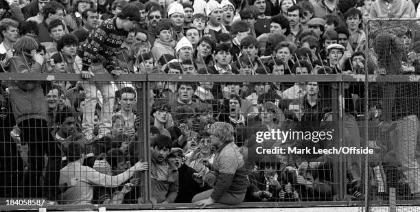 Oxford United v Manchester City -, City fans vandalise the perimeter fence and try to stage a pitch invasion.