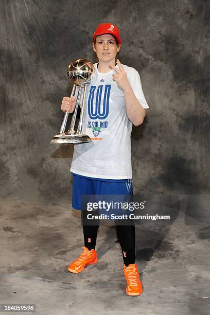 Lindsay Whalen of the Minnesota Lynx poses for a picture with the trophy after winning Game 3 of the 2013 WNBA Finals at Gwinnett Arena on October...