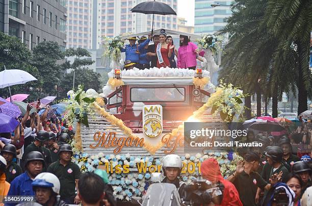 Filipinos welcome home the recently crowned Miss World 2013, Megan Young, in Makati city on October 11, 2013 in Manila, Philippines. The 23-year-old...
