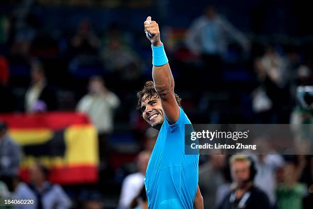 Rafael Nadal of Spain celebrates after defeating Stanislas Wawrinka of Switzerland during day five of the Shanghai Rolex Masters at the Qi Zhong...