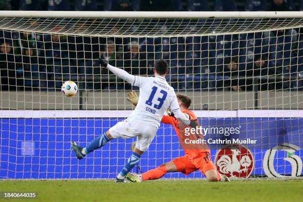 Lars Stindl of Karlsruher SC scores his team's second goal past Ron-Robert Zieler of Hannover 96 during the Second Bundesliga match between Hannover...