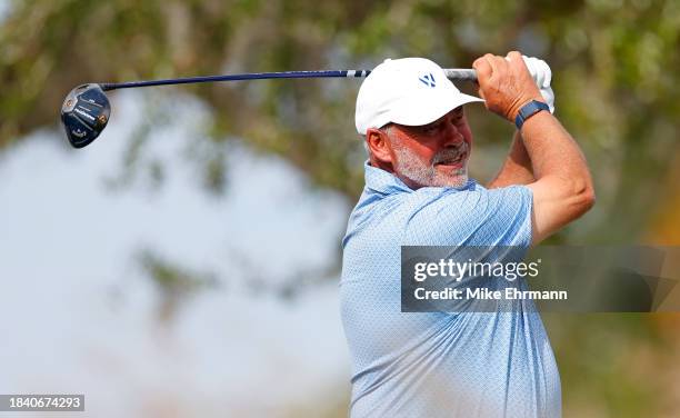 Darren Clarke of Northern Ireland playing for Team Europe plays his shot from the third tee on day two of the World Champions Cup at The Concession...