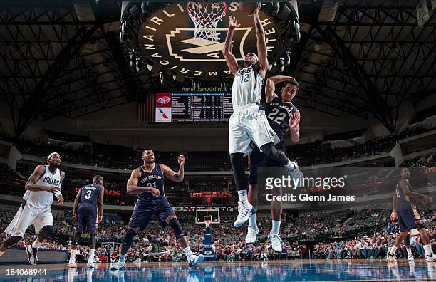 Kennedy of the Dallas Mavericks drives to the basket during the game against the New Orleans Pelicans on October 7, 2013 at the American Airlines...