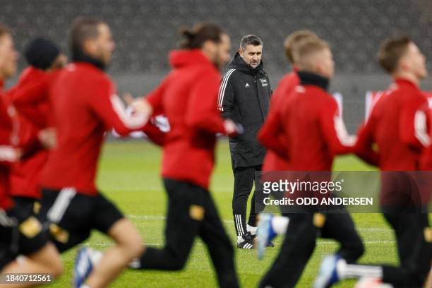 Union Berlin's Head coach Nenad Bjelica oversees a training session in Berlin on December 11 on the eve of their UEFA Champions League Group C match...