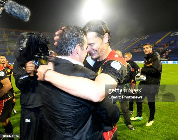 Marc Wilmots, headcoach of Belgium Daniel Van Buyten of Belgium celebrate the win and qualification for Worldcup 2014 during the World Cup 2014...