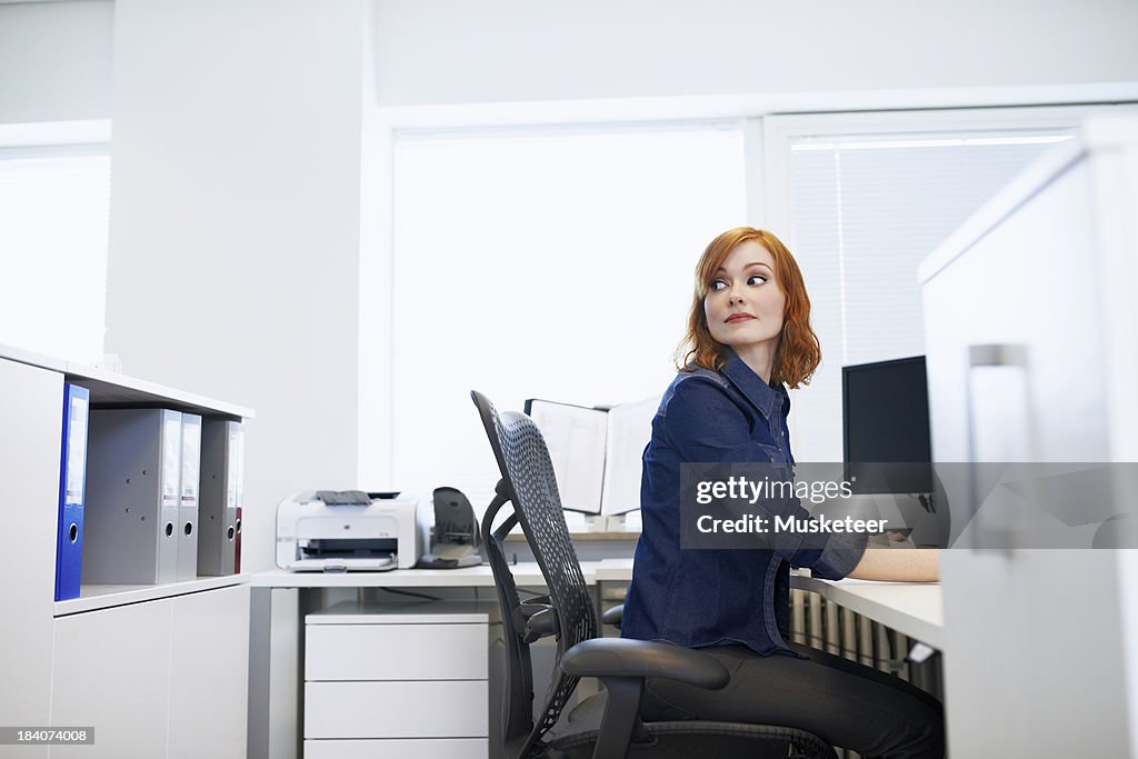 Businesswoman sitting at a desk