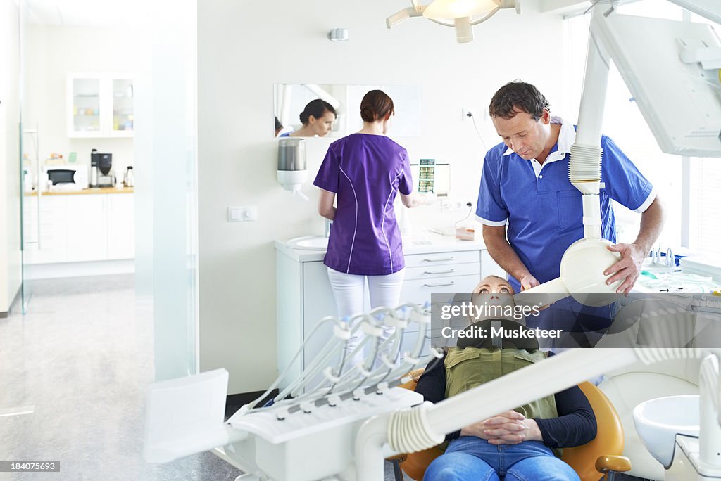 Dentist taking x-ray images