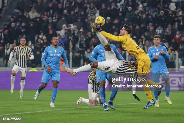 Weston McKennie of Juventus attempts an overhead kick as he is challenged by Alex Meret of SSC Napoli during the Serie A TIM match between Juventus...