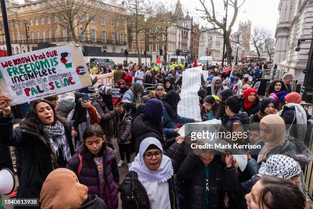 Parents For Palestine arrive outside Downing Street to deliver an open letter to the Prime Minister signed by thousands of parents calling for a...