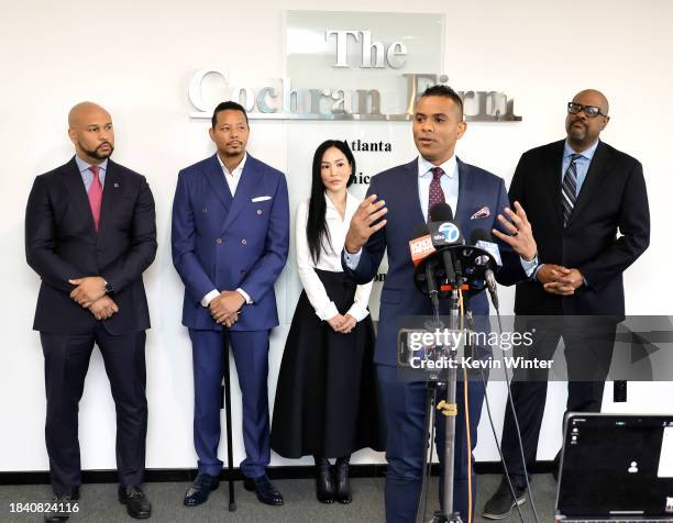 Terrence Howard, speaking at podium, with attorney Carlos Moore, attorney James Bryant, Howard's wife Miranda Pak, and attorney Brian Dunn announces...