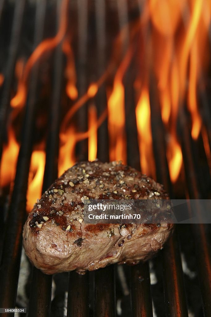 Grilled beef steak and fire