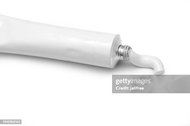 isolated white tube of paint, paint squeezed out - toothpaste stock pictures, royalty-free photos & images