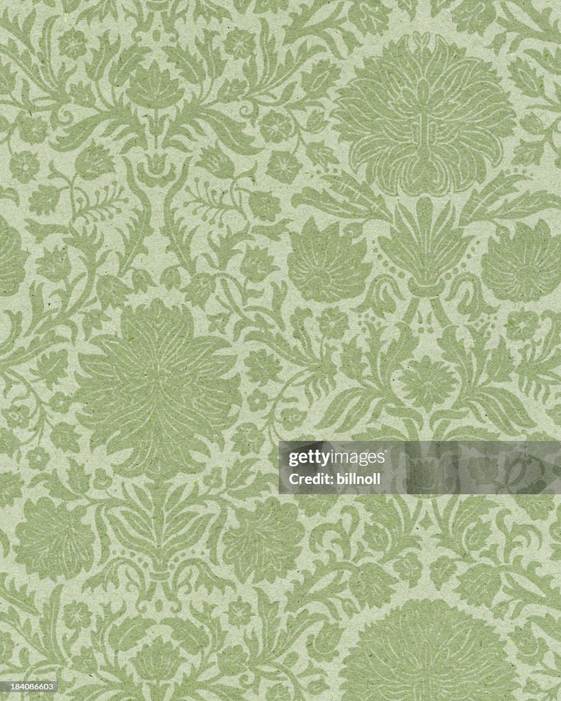 Papel desbotado com emblema de floral