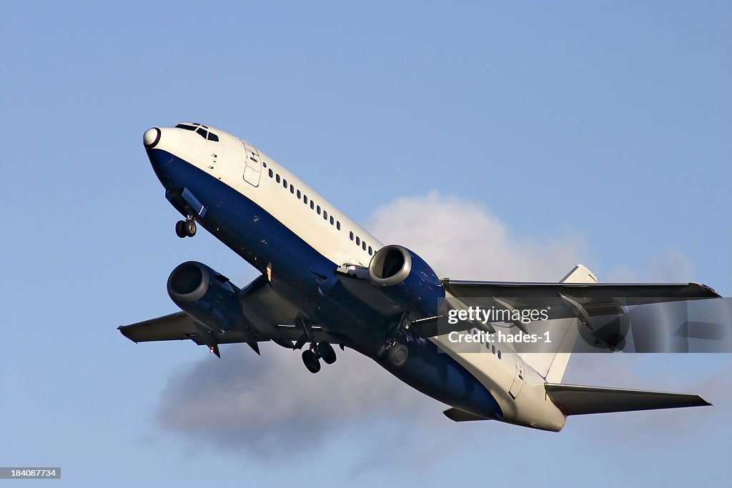 Airplane and cloud
