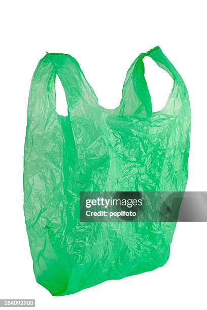 green plastic bag - plastic bag stock pictures, royalty-free photos & images