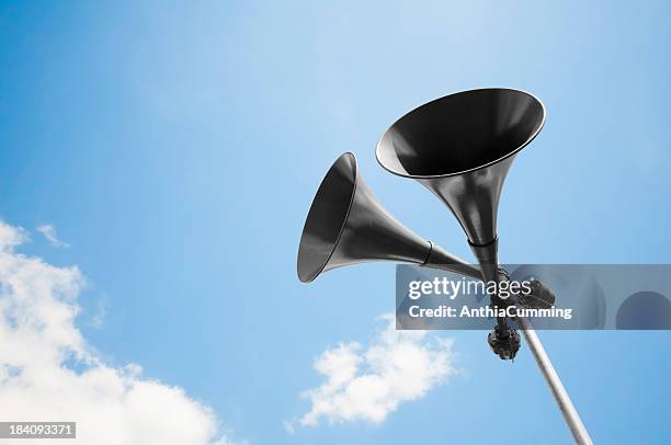 megaphone loudspeakers standing high up in the air - public address system stock pictures, royalty-free photos & images