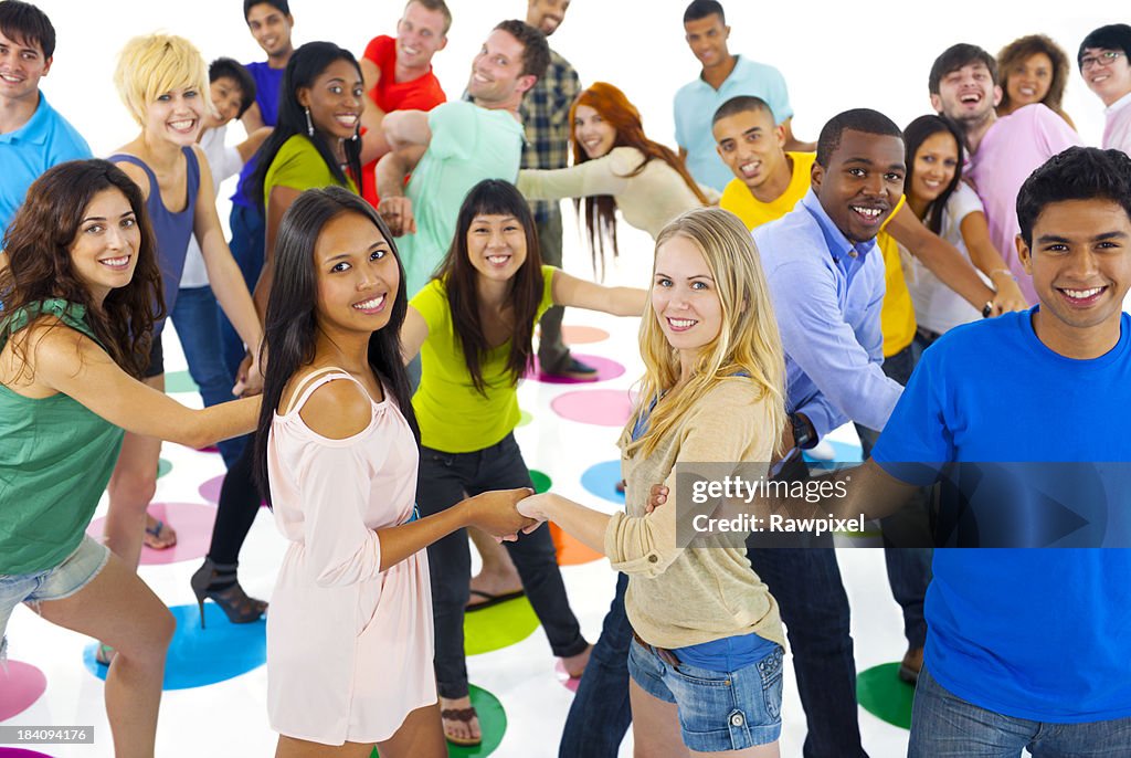 Large group of Multi Ethnic young people Connecting together