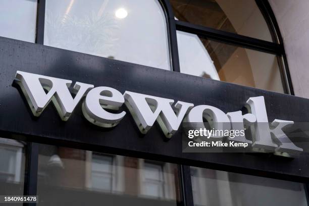 Logo for the shared working spaces company We Work on 14th November 2023 in London, United Kingdom. WeWork Inc. Is a start-up company which offers...