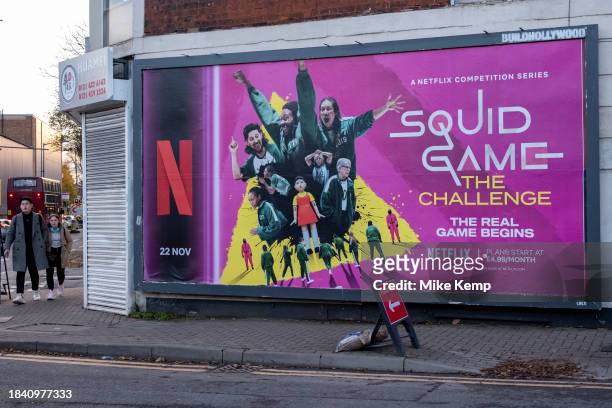 Advertising billboard poster for Netflix competition television show Squid Game The Challenge on 29th November 2023 in Birmingham, United Kingdom....