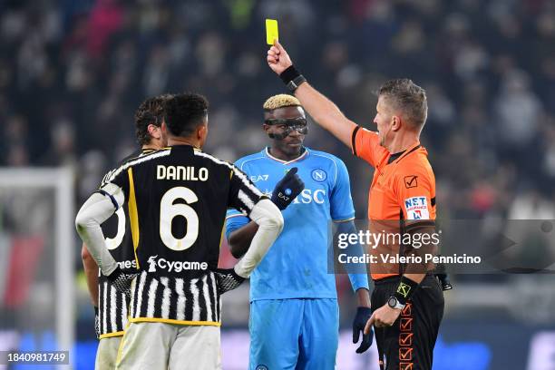 Victor Osimhen of SSC Napoli is shown a yellow card by Match Referee, Daniele Orsato during the Serie A TIM match between Juventus and SSC Napoli at...