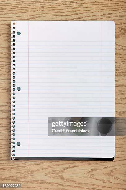 notepad on a desk - spiral notebook stock pictures, royalty-free photos & images