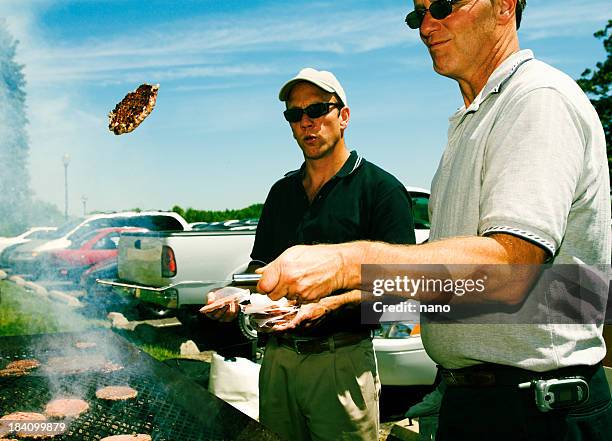 tailgate toss - man throwing stock pictures, royalty-free photos & images