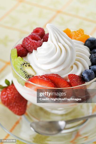 frozen yogurt with fresh fruit - yogurt swirl stock pictures, royalty-free photos & images