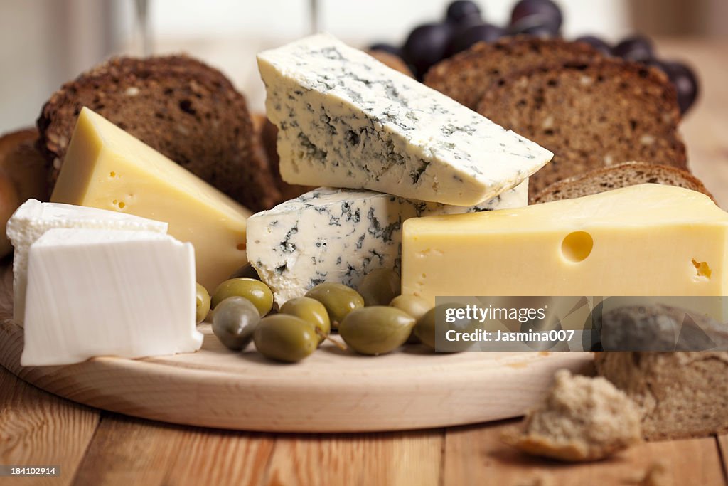 Cheese with bread and olives