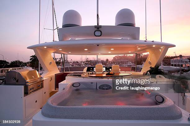 flybridge deck luxury motor yacht - luxury yacht stock pictures, royalty-free photos & images