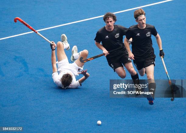 Lucas Putters of Belgium , James Nicolson of New Zealand and Patrick Ward of New Zealand in action during the FIH Hockey Men's Junior World Cup...