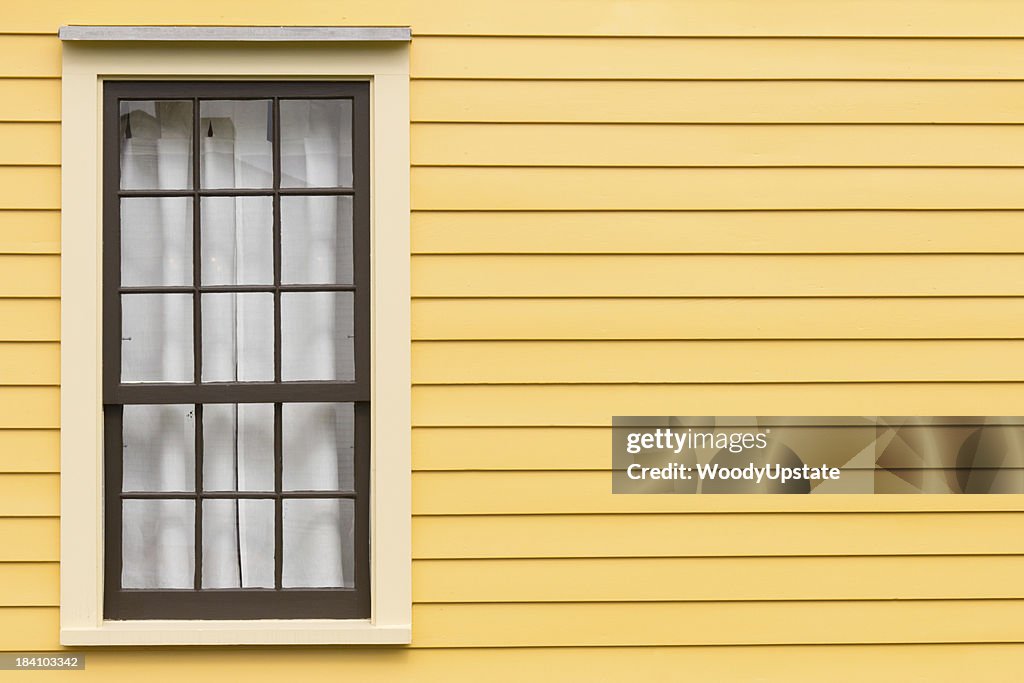 Antique Window and Yellow Wall