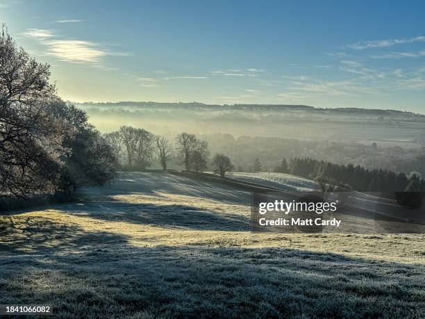 Early morning mist still lingers in woods close to the village of Holcombe, on December 2, 2022 in Somerset, England. After a period of wet and windy...