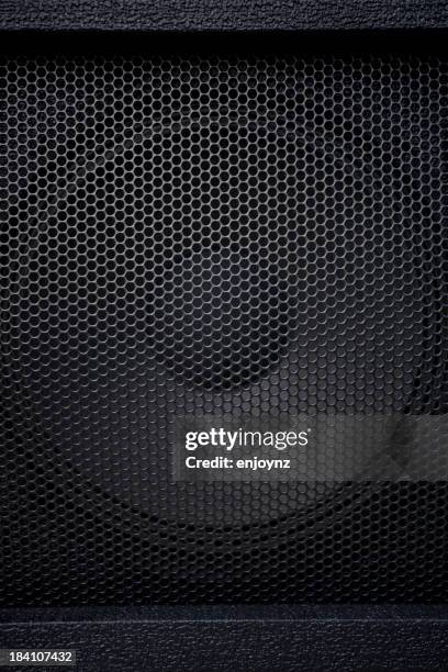 black speaker grille on white background - amplifier abstract stock illustrations