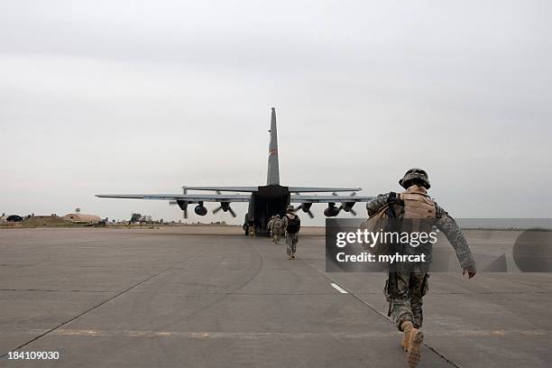 loading up - military deployment stock pictures, royalty-free photos & images
