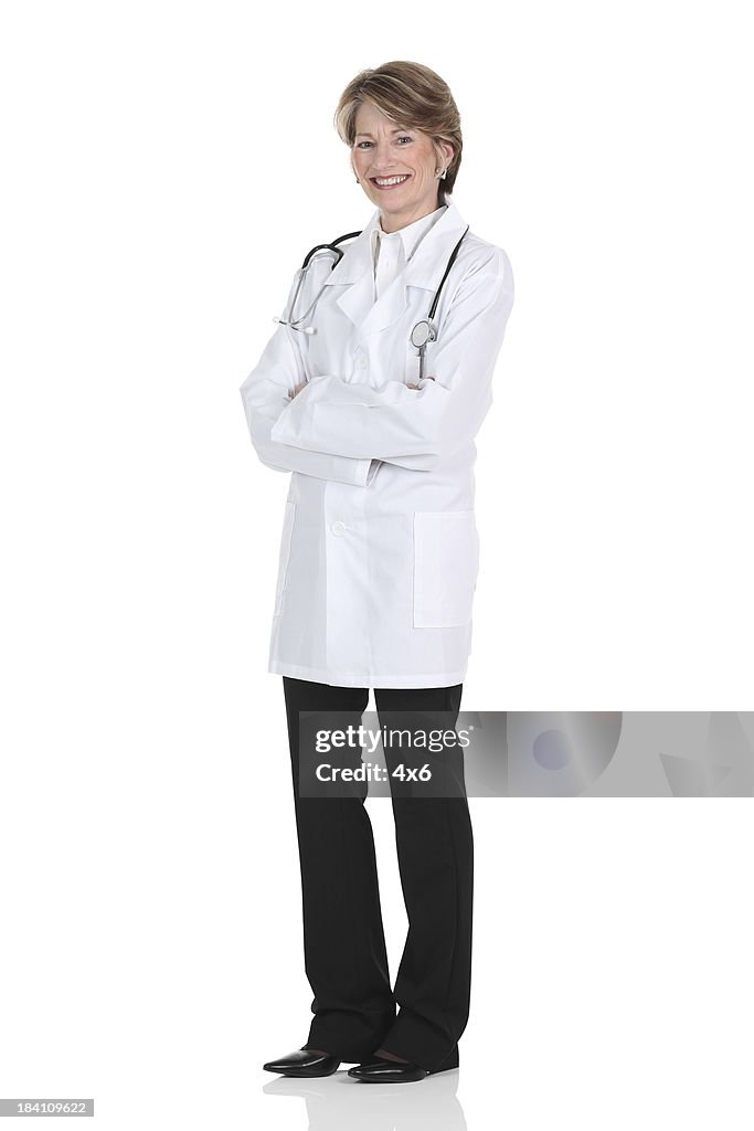 Female doctor standing with arms crossed