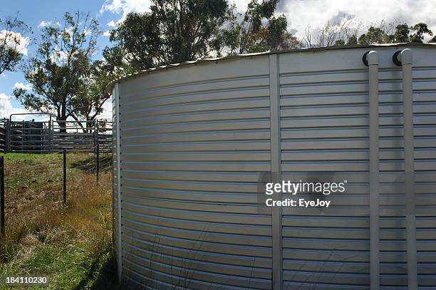 rain water catching and holding tank - water tower storage tank stock pictures, royalty-free photos & images