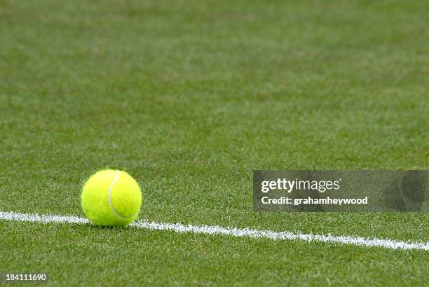 on the line - tennis ball stock pictures, royalty-free photos & images