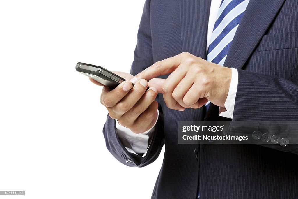 Businessman Texting on a Phone