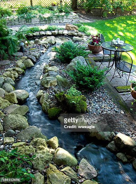 streamside garden spot - landscaped patio stock pictures, royalty-free photos & images