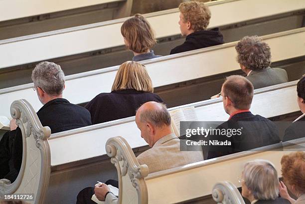 praying in a church - prayer meeting stock pictures, royalty-free photos & images